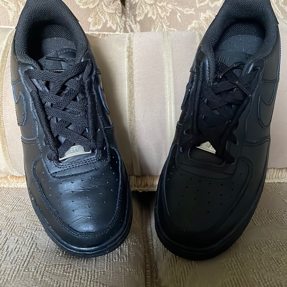 Black Nike Air Force.Never worn just tried on in the house.